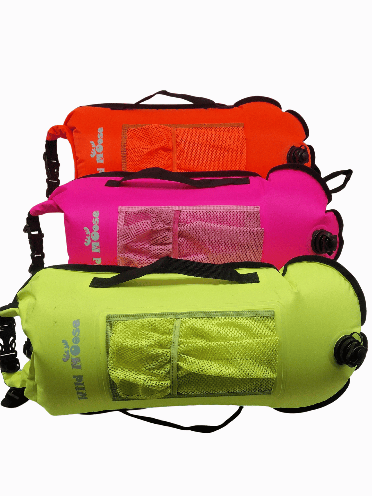 3 tow floats lying on their side: pink, orange and lime coloured