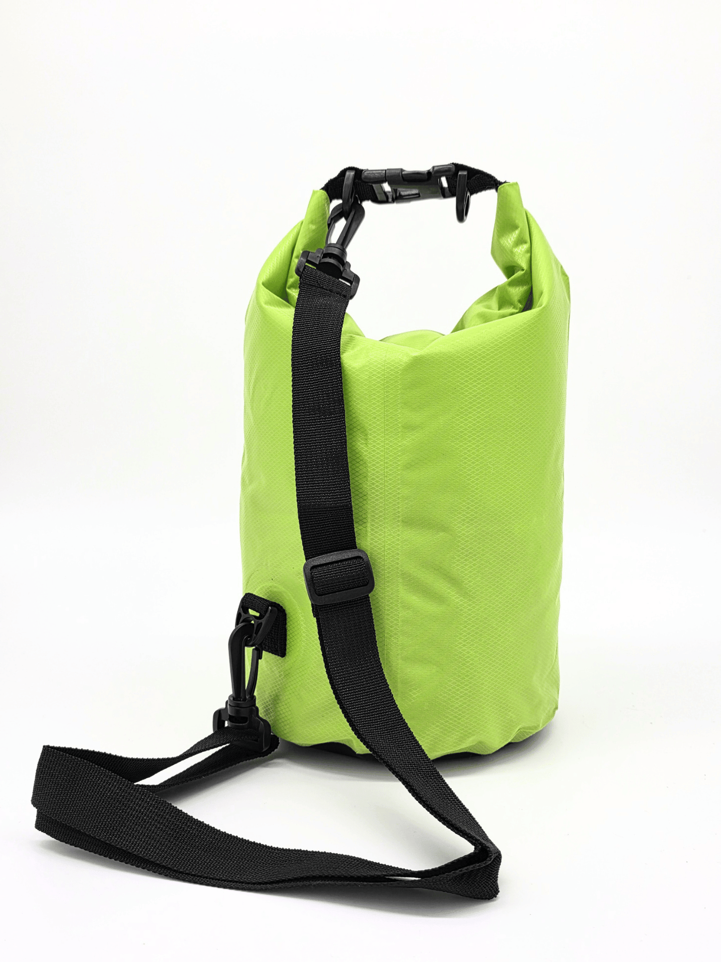 neon green drybag with black strap on a white background