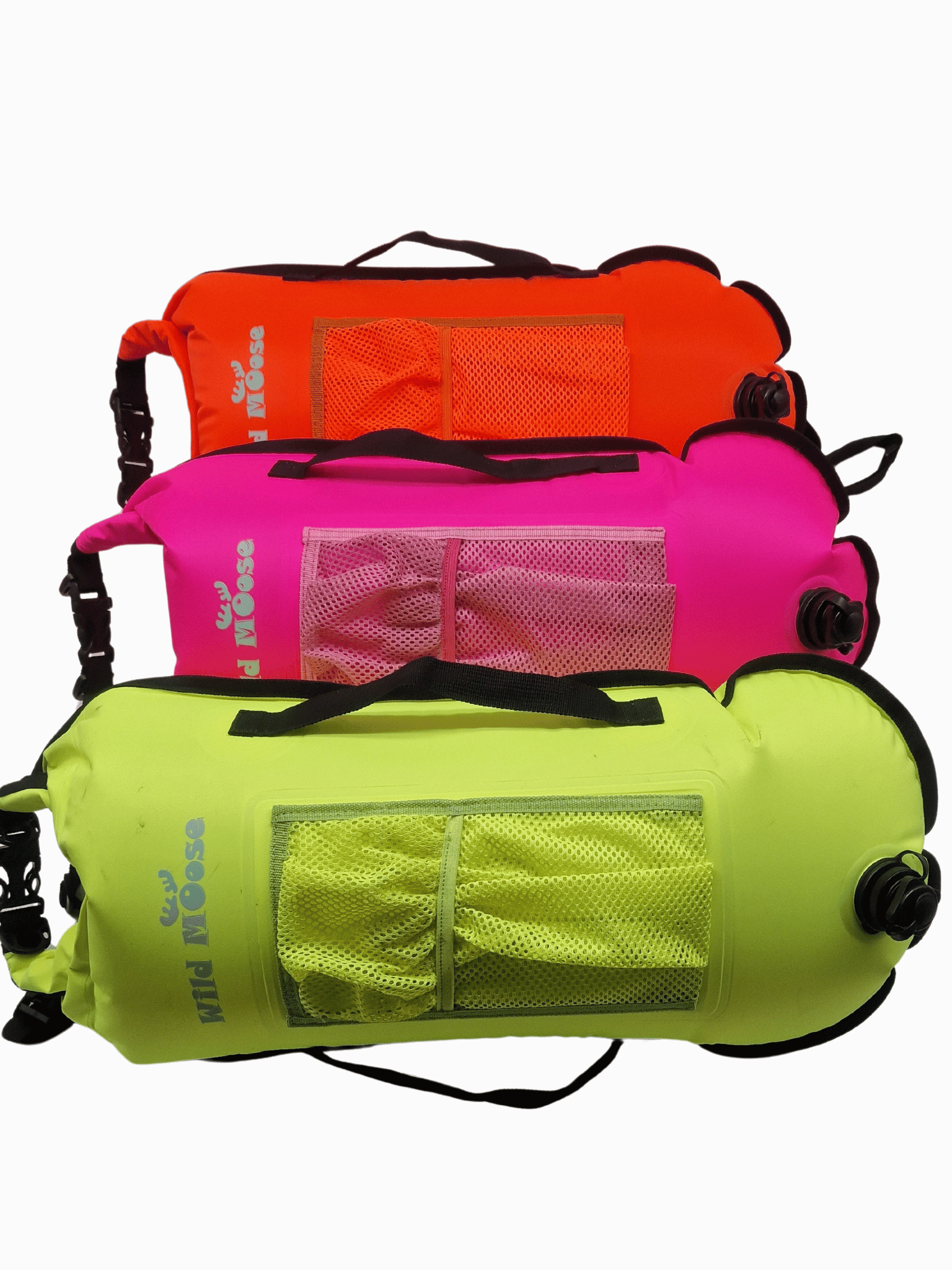 3 tow floats lying on their side: pink, orange and lime coloured