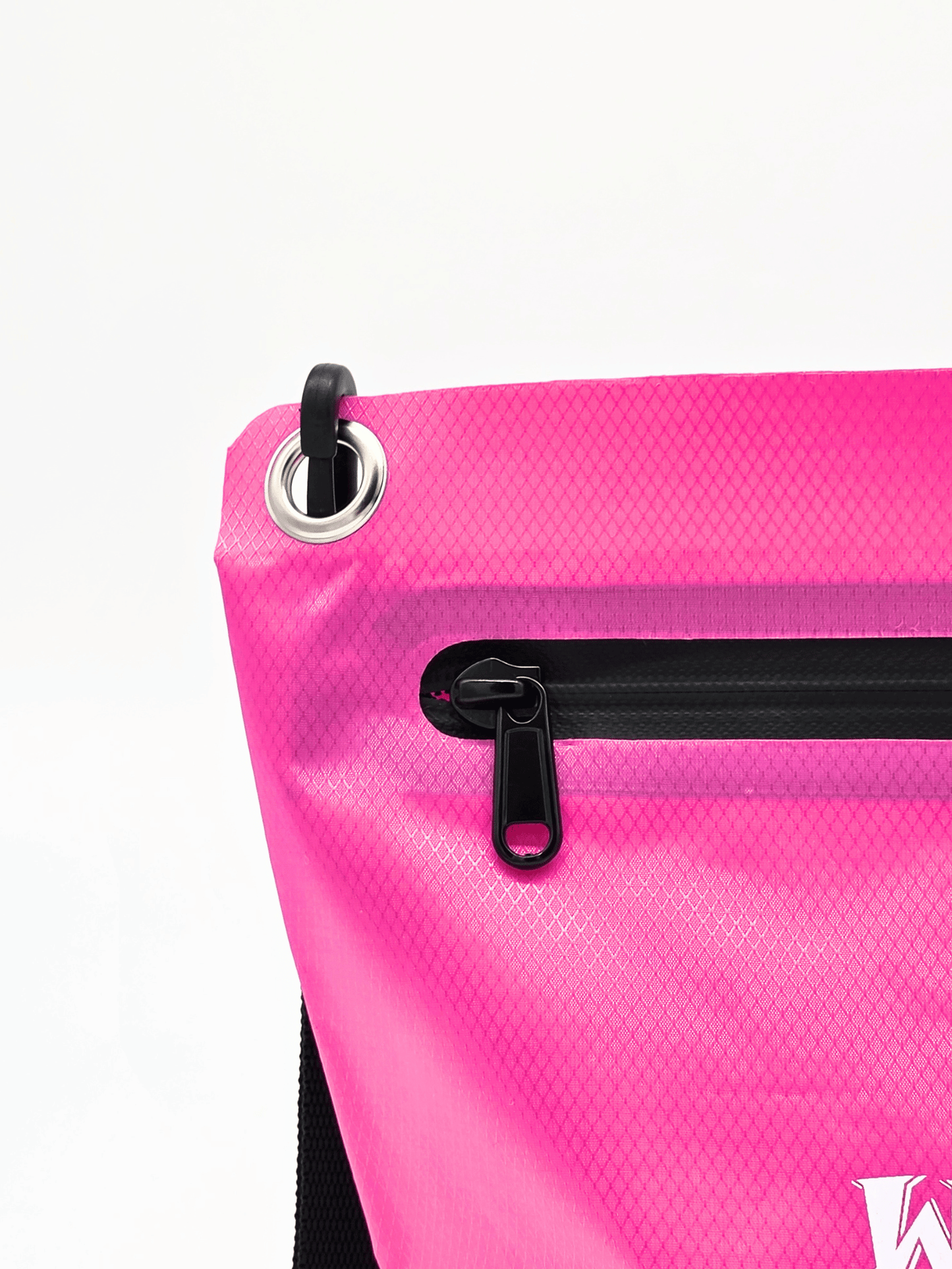 close up of the splashproof zip on a pink dry bag.