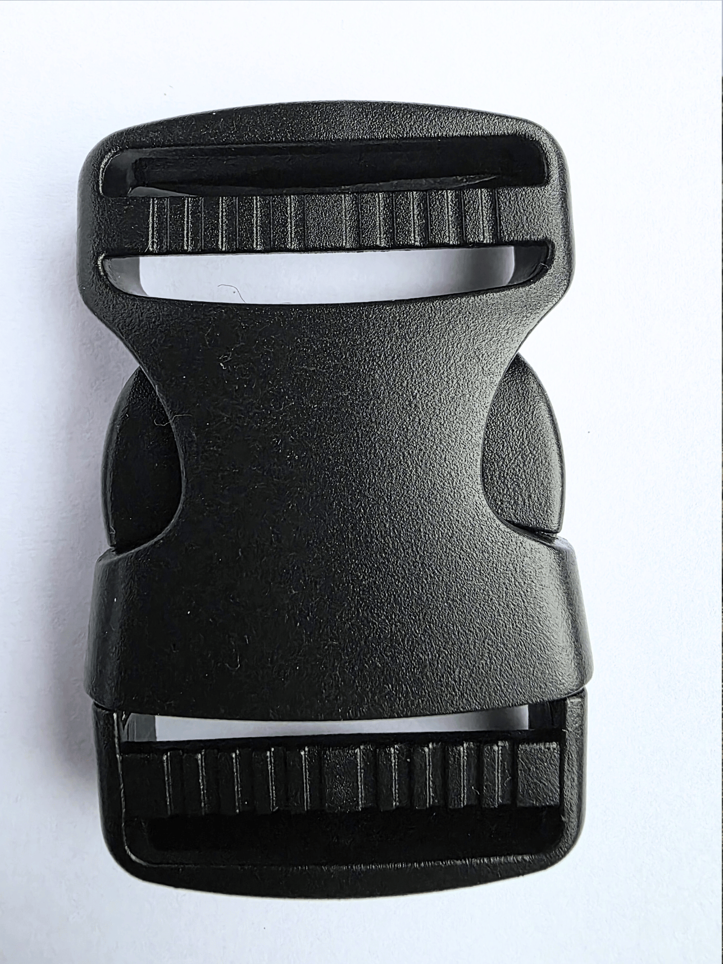 Black, plastic side release buckle 