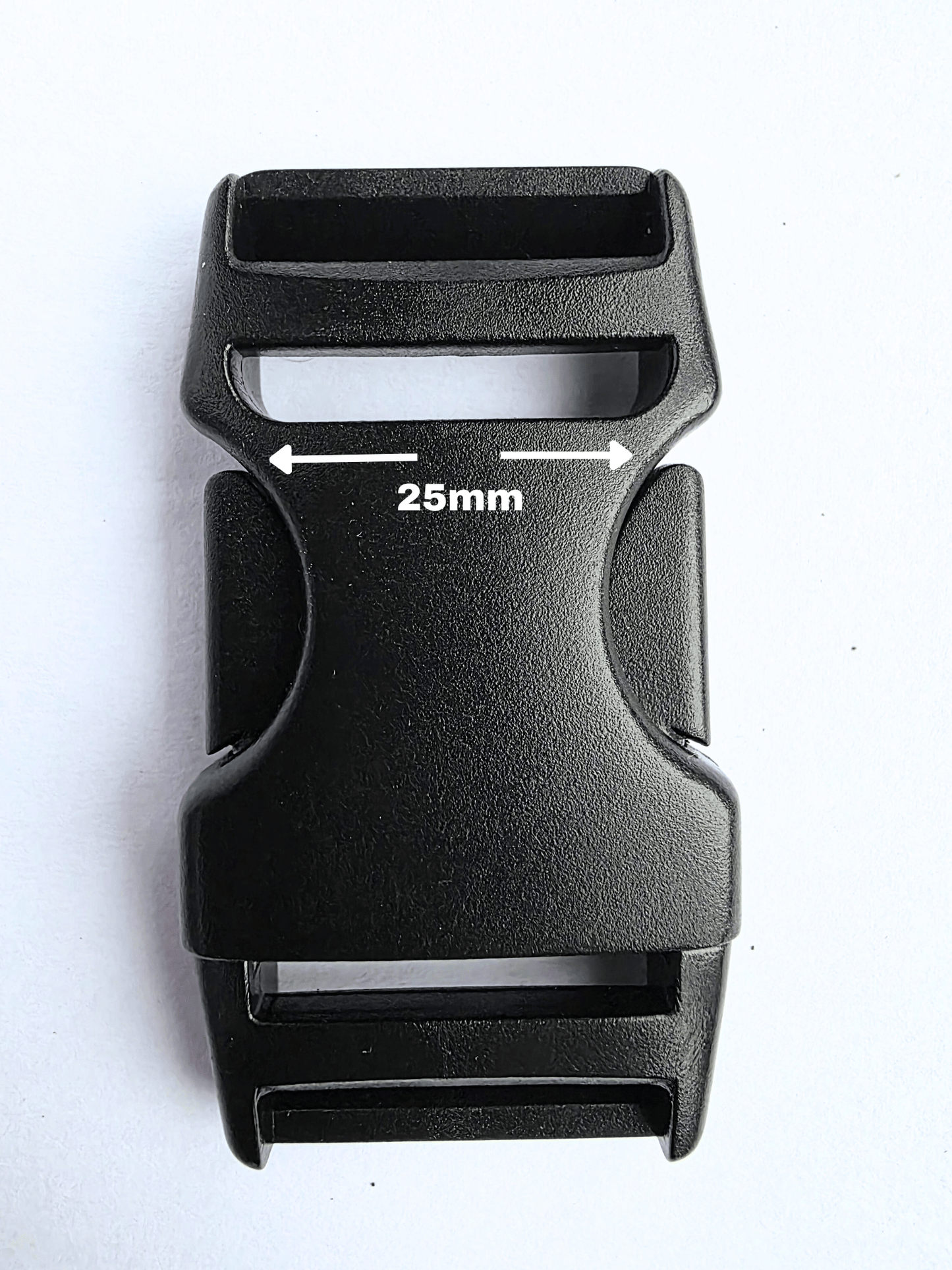 Black, plastic side release buckle showing strap width of 25mm