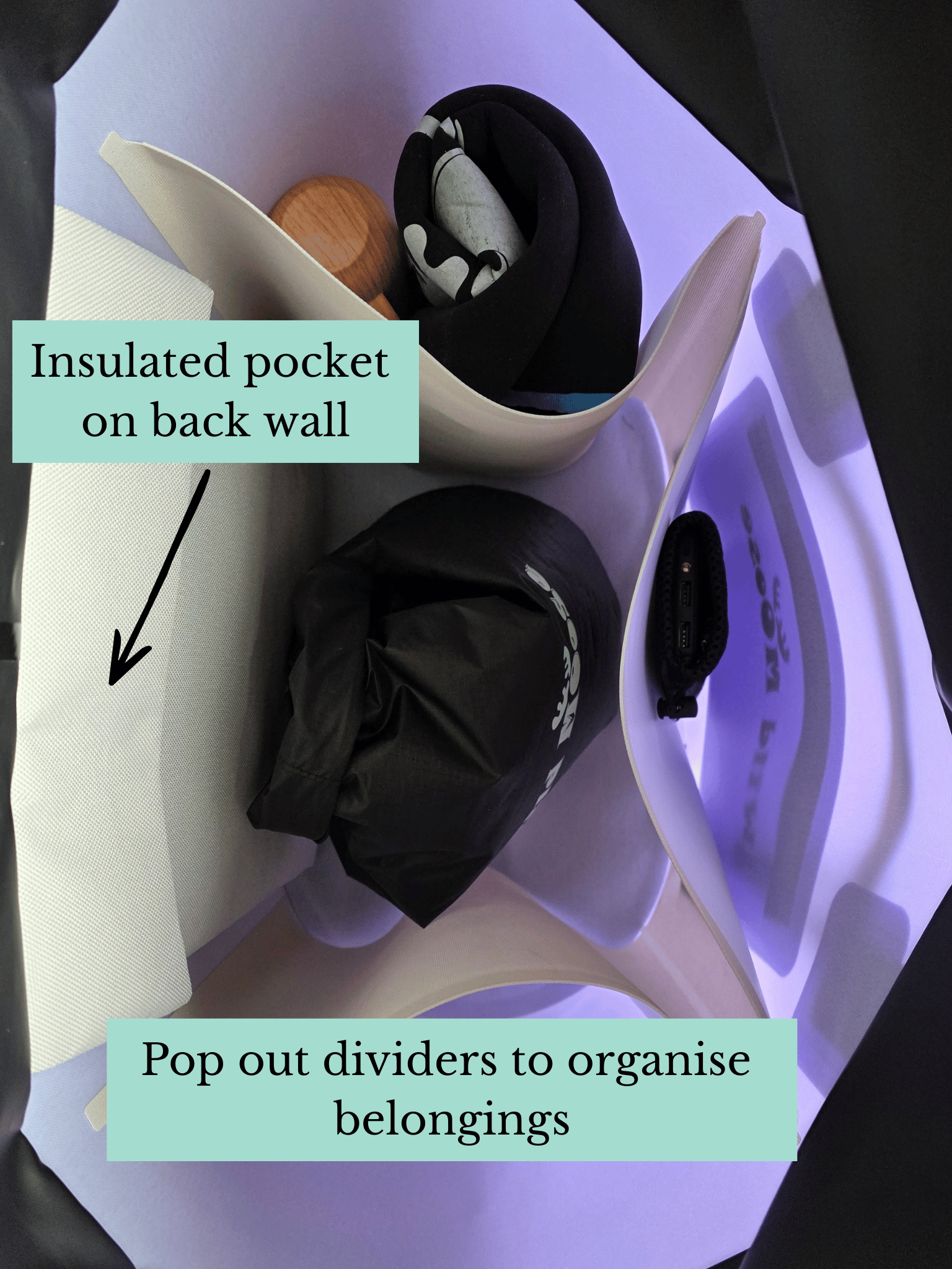 inside a tote bag with the internal dividers pushed out to show how you can organise your swim kit. Also pointing out an insulated pocket on the back wall of the bag.