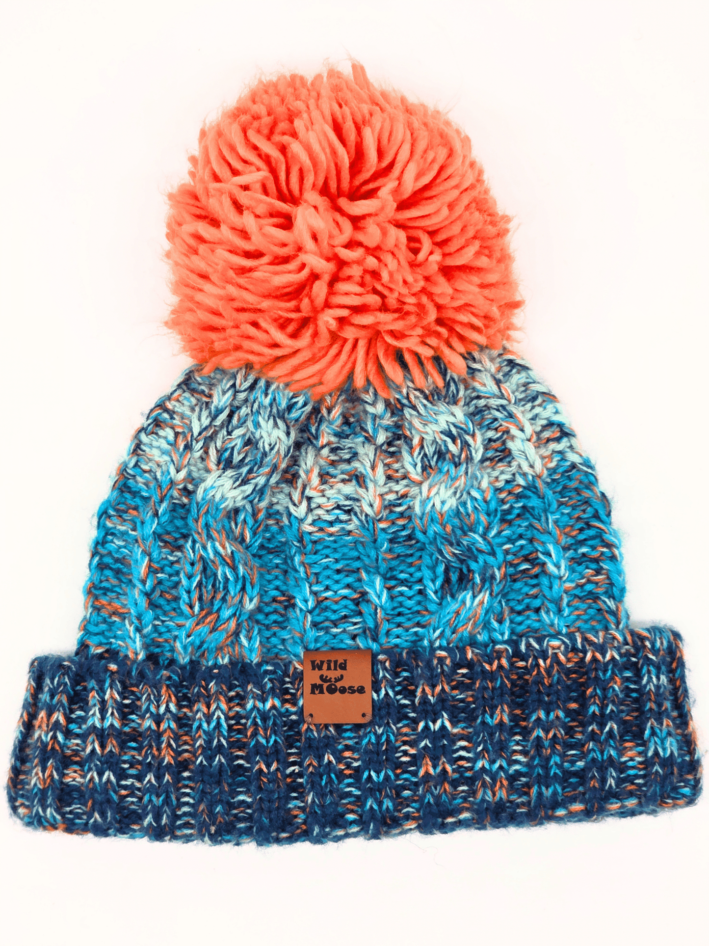 blue knitted beanie with an orange pom-pom on a white background.